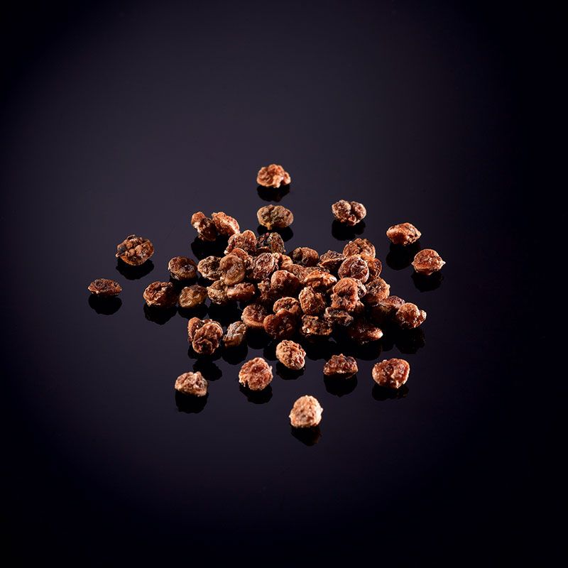 Baies roses déshydratées et décortiquées Baies